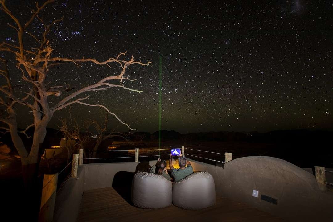 Guests stargazing in the Namib Desert