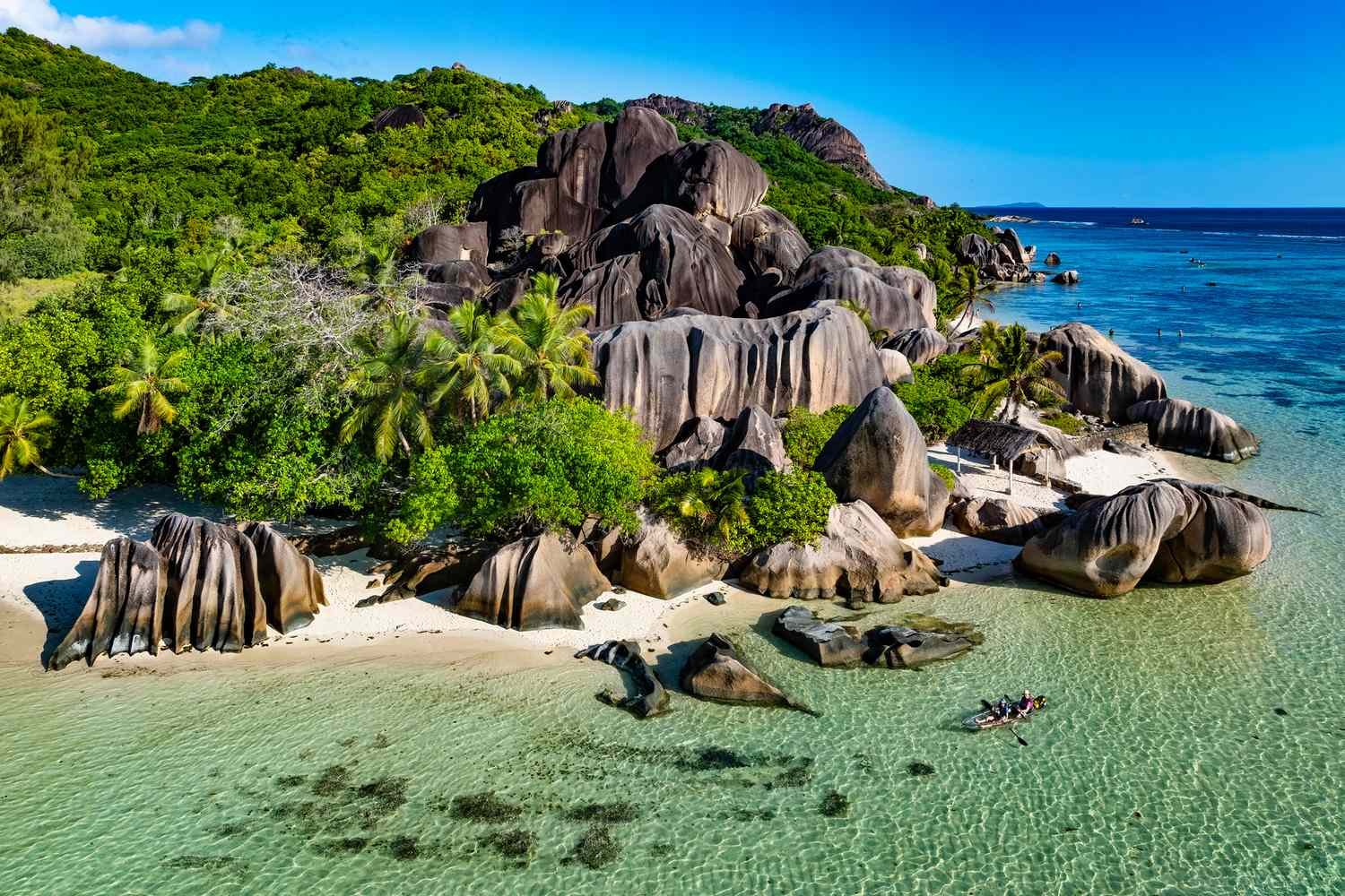 Granite boulders on pink sand at Anse Source d'Argent, La Digue