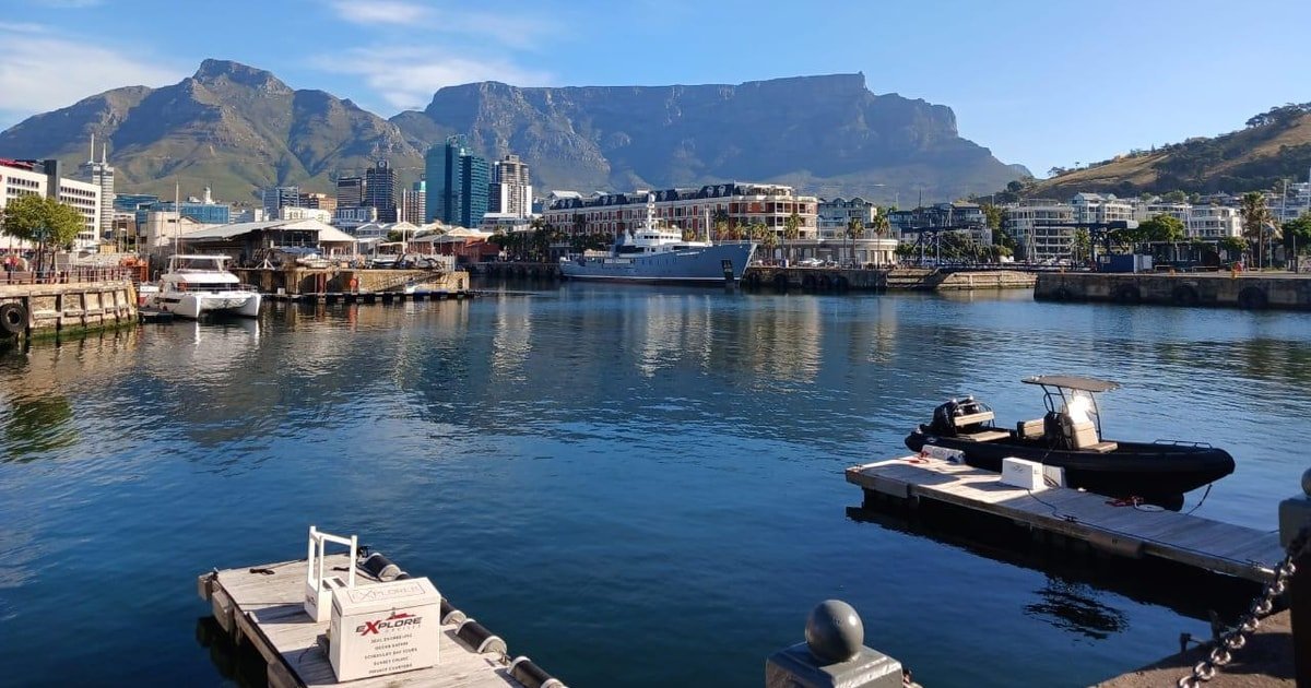 Boats in Cape Town harbour at the V&A Waterfront with Table Mountain in the background