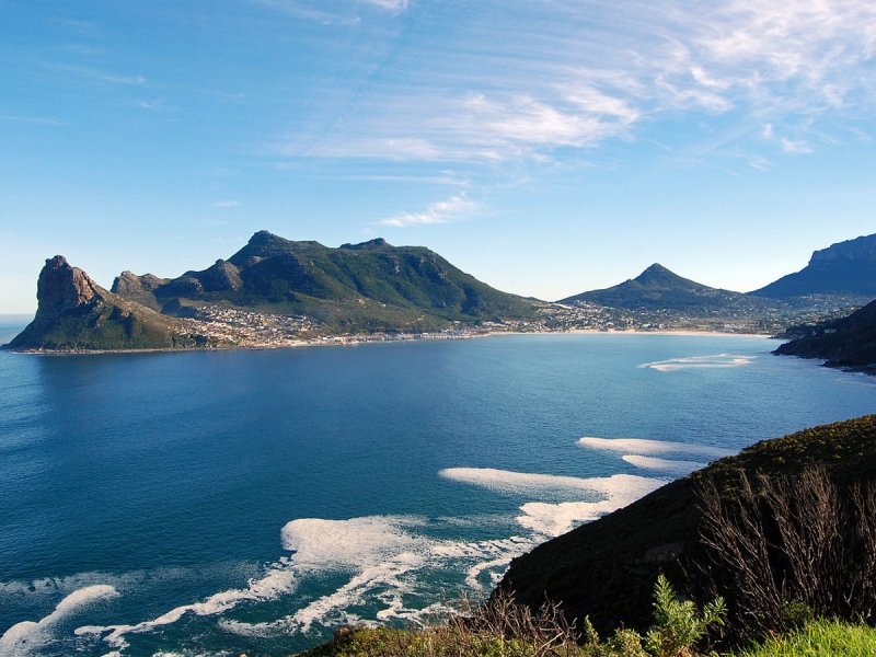 Chapman's Peak Drive winding along coastal cliffs above Hout Bay near Cape Town