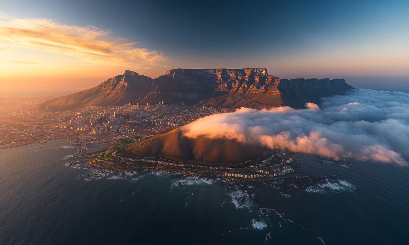 Panoramic view of the cliffs of Cape Point and False Bay at golden hour, Cape Town, South Africa